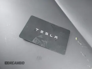 2024 Tesla Model Y Long Range z VIN 7SAYGDEE2RA244595, wystawiony jako IAAI lot #41964965 z przebiegiem 14 804 mil mil oraz . Historia ofert i sprzedaży dostępna na DreamBid. Obrazek 11.