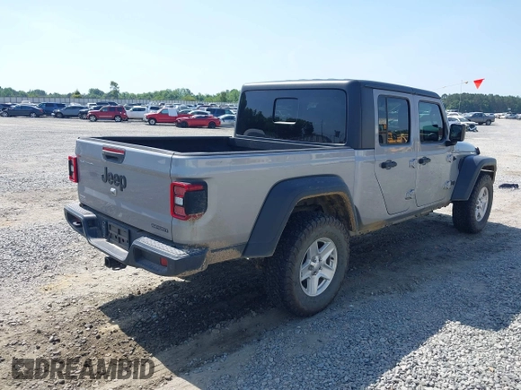 2020 Jeep Gladiator Sport S with VIN 1C6HJTAG7LL128940, listed as a IAAI auction lot 42108154 with 90,596 mi miles and . Bid and sale history available at DreamBid. Image 4.