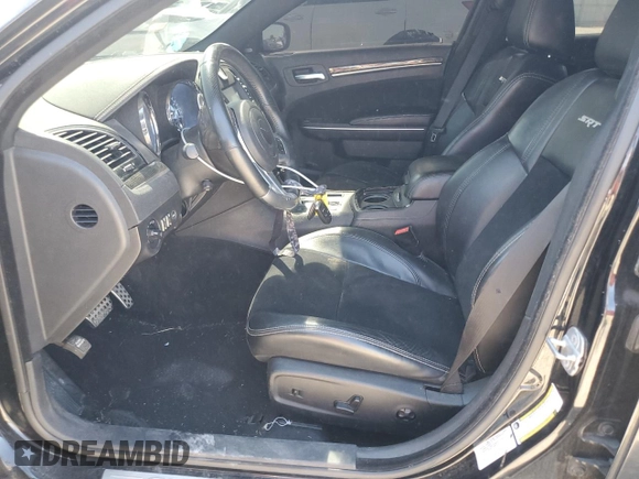 2013 Chrysler 300 SRT-8 with VIN 2C3CCAFJ9DH731557, listed as a Copart auction lot 69700344 with 174,242 mi miles and Salvage Title. Bid and sale history available at DreamBid. Image 7.