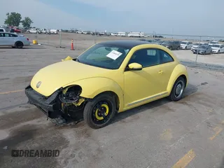 2013 Volkswagen Beetle with VIN 3VWHX7AT0DM603661, listed as a IAAI auction lot 42464030 with 95,159 mi miles and . Bid and sale history available at DreamBid. Image 2.