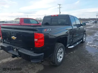 2018 Chevrolet Silverado 1500 LT with VIN 1GCVKREC1JZ349561, listed as a IAAI auction lot 41277292 with 102,525 mi miles. Bid and sale history available at carsss.com. Image 4.
