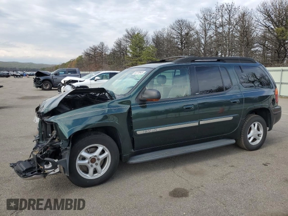 2003 GMC Envoy SLT z VIN 1GKET16P936191818, wystawiony jako Copart lot #53270645 z przebiegiem 130 357 mil mil oraz Szkody całkowita. Historia ofert i sprzedaży dostępna na DreamBid. Obrazek 1.