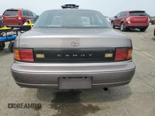 1992 Toyota Camry с VIN 4T1SK11E8NU009222, выставлен на аукционе Copart как лот 60811625 с пробегом 143 925 миль миль и Чистый • Clean title. История ставок и продаж доступна на DreamBid. Изображение 6.