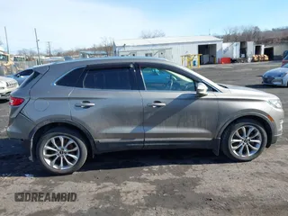2016 Lincoln MKC Select with VIN 5LMCJ2D95GUJ08172, listed as a IAAI auction lot 41504279 with 73,425 mi miles and . Bid and sale history available at DreamBid. Image 13.