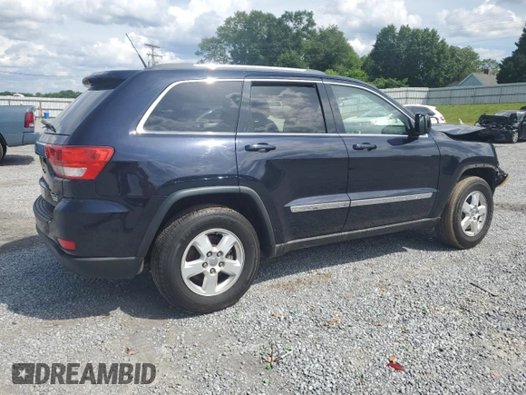 2011 Jeep Grand Cherokee Laredo with VIN 1J4RR4GG7BC515001, listed as a Copart auction lot 56432905 with 143,181 mi miles and Salvage title. Bid and sale history available at DreamBid. Image 3.