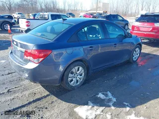2014 Chevrolet Cruze LS with VIN 1G1PB5SH6E7325770, listed as a IAAI auction lot 41696037 with 114,931 mi miles. Bid and sale history available at carsss.com. Image 4.