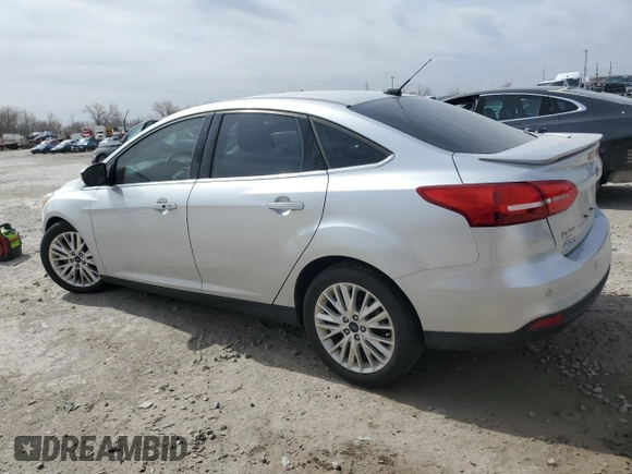 2017 Ford Focus Titanium with VIN 1FADP3J23HL347739, listed as a Copart auction lot 49385365 with 79,484 mi miles and Salvage title. Bid and sale history available at DreamBid. Image 2.