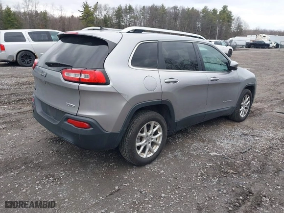 2015 Jeep Cherokee Latitude with VIN 1C4PJLCB0FW506203, listed as a IAAI auction lot 41877342 with NaN miles. Bid and sale history available at carsss.com. Image 4.
