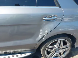 2013 Mercedes-Benz M ML 63 AMG with VIN 4JGDA7EB9DA155725, listed as a IAAI auction lot 41502675 with 64,849 mi miles. Bid and sale history available at carsss.com. Image 6.