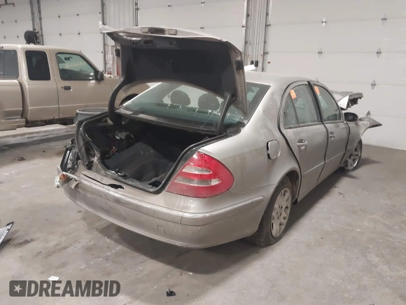 2005 Mercedes-Benz E-Class 3.2L with VIN WDBUF65J95A630717, listed as a IAAI auction lot 41423947 with 6,263 mi miles. Bid and sale history available at carsss.com. Image 4.