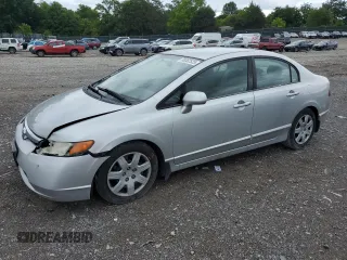 2006 Honda Civic LX with VIN 1HGFA16566L116537, listed as a Copart auction lot 58382525 with 209,602 mi miles and Salvage title. Bid and sale history available at DreamBid. Image 1.