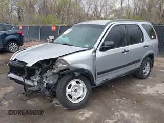 2002 Honda CR-V LX z VIN JHLRD78402C077631, wystawiony jako IAAI lot #41918750 z przebiegiem 186 827 mil mil oraz . Historia ofert i sprzedaży dostępna na DreamBid. Obrazek 2.