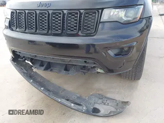 2018 Jeep Grand Cherokee Altitude with VIN 1C4RJFAG9JC436848, listed as a IAAI auction lot 42303459 with 124,044 mi miles and . Bid and sale history available at DreamBid. Image 6.