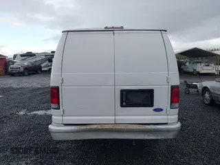 1996 Ford Econoline Cargo with VIN 1FTJS34H4THA69893, listed as a IAAI auction lot 41703257 with 206,503 mi miles and . Bid and sale history available at DreamBid. Image 16.