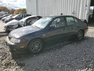 2000 Infiniti G20 Luxury z VIN JNKCP11A3YT302798, wystawiony jako Copart lot #75732564 z przebiegiem 256 963 mil mil oraz Szkoda całkowita • Salvage title. Historia ofert i sprzedaży dostępna na DreamBid. Obrazek 1.