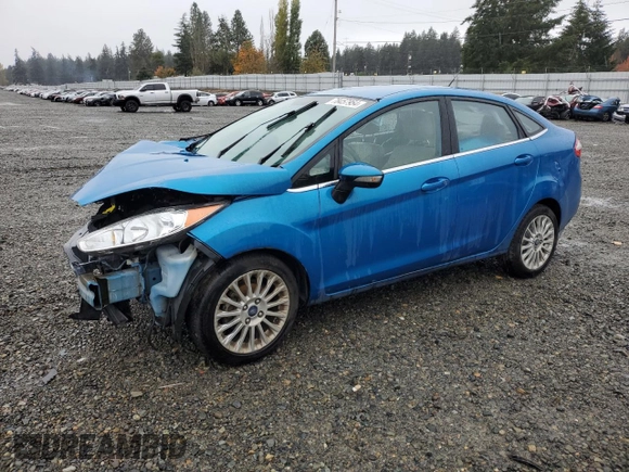 2016 Ford Fiesta Titanium z VIN 3FADP4CJ3GM108313, wystawiony jako Copart lot #78457954 z przebiegiem 44 726 mil mil oraz Szkoda całkowita • Salvage title. Historia ofert i sprzedaży dostępna na DreamBid. Obrazek 1.