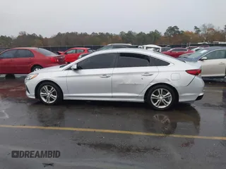 2018 Hyundai Sonata SEL with VIN 5NPE34AF0JH696872, listed as a IAAI auction lot 41070305 with 121,000 mi miles and . Bid and sale history available at DreamBid. Image 14.