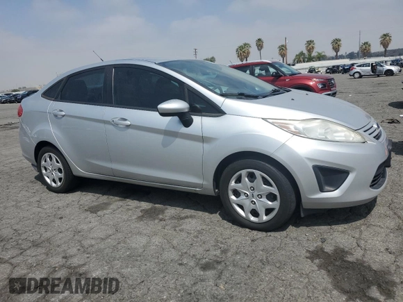 2012 Ford Fiesta S with VIN 3FADP4AJXCM129415, listed as a Copart auction lot 55447135 with 138,343 mi miles and Clean Title. Bid and sale history available at carsss.com. Image 4.