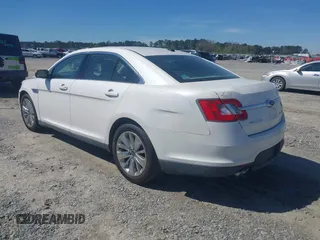 2011 Ford Taurus Limited with VIN 1FAHP2FW1BG121044, listed as a IAAI auction lot 41864054 with 217,929 mi miles and . Bid and sale history available at carsss.com. Image 3.