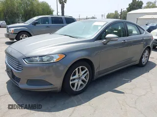 2014 Ford Fusion SE with VIN 3FA6P0HD4ER299227, listed as a IAAI auction lot 42163439 with 153,856 mi miles and . Bid and sale history available at DreamBid. Image 2.