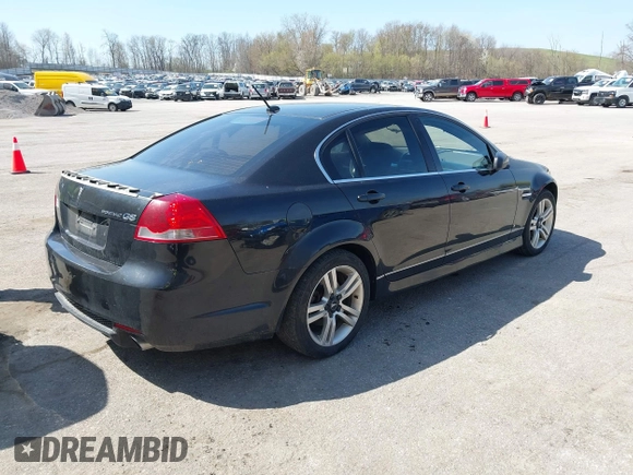 2009 Pontiac G8 with VIN 6G2ER57769L185606, listed as a IAAI auction lot 42112142 with 187,365 mi miles. Bid and sale history available at carsss.com. Image 4.