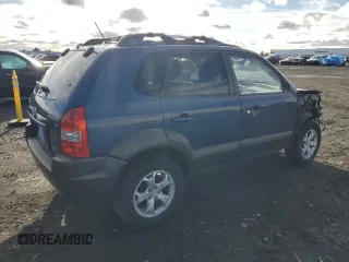 2009 Hyundai Tucson SE with VIN KM8JN72D89U977046, listed as a Copart auction lot 80712994 with 60,863 mi miles and Salvage Title. Bid and sale history available at carsss.com. Image 3.