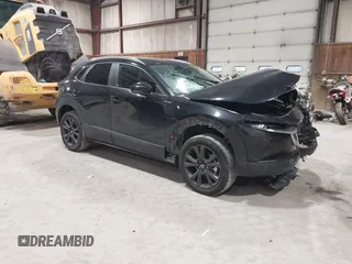 2025 Mazda CX-30 S Select Sport with VIN 3MVDMBBM2SM755621, listed as a IAAI auction lot 41945799 with 2,401 mi miles and . Bid and sale history available at DreamBid. Image 1.