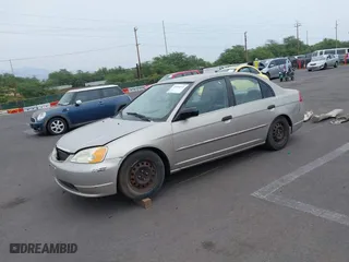 2001 Honda Civic LX with VIN 2HGES16591H557741, listed as a IAAI auction lot 41966212 with 231,347 mi miles. Bid and sale history available at carsss.com. Image 2.