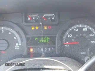 2014 Ford Econoline Cargo Commercial with VIN 1FTSE3EL0EDA04144, listed as a IAAI auction lot 41833930 with 159,405 mi miles. Bid and sale history available at carsss.com. Image 7.