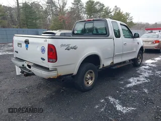 2003 Ford F-150 XL with VIN 1FTRX18W43NB84285, listed as a IAAI auction lot 41494919 with 197,352 mi miles. Bid and sale history available at carsss.com. Image 4.