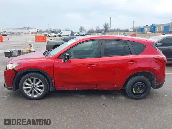 2015 Mazda CX-5 Grand Touring with VIN JM3KE4DY1F0540586, listed as a IAAI auction lot 41710216 with 148,800 mi miles. Bid and sale history available at carsss.com. Image 14.