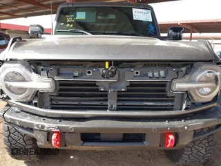 2021 Ford Bronco z VIN 1FMDE5CP3MLB06340, wystawiony jako IAAI lot #41681167 z przebiegiem 28 520 mil mil oraz . Historia ofert i sprzedaży dostępna na DreamBid. Obrazek 6.