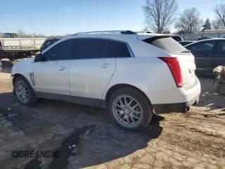 2015 Cadillac SRX Premium Collection with VIN 3GYFNGE35FS546957, listed as a Copart auction lot 42189045 with 100,079 mi miles and Salvage Title. Bid and sale history available at carsss.com. Image 2.