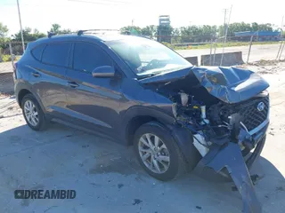 2021 Hyundai Tucson Value with VIN KM8J33A4XMU364628, listed as a IAAI auction lot 41826641 with 68,013 mi miles. Bid and sale history available at carsss.com. Image 1.