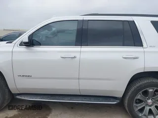 2019 GMC Yukon SLT with VIN 1GKS1BKCXKR329607, listed as a IAAI auction lot 41188239 with 84,940 mi miles. Bid and sale history available at carsss.com. Image 14.
