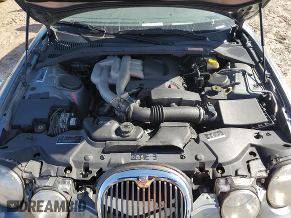 2003 Jaguar S-Type with VIN SAJEB01T83FM51480, listed as a Copart auction lot 43444065 with 83,840 mi miles and Salvage Title. Bid and sale history available at DreamBid. Image 12.