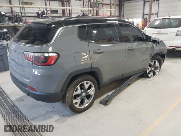 2021 Jeep Compass Limited with VIN 3C4NJDCBXMT596069, listed as a IAAI auction lot 42051527 with 120,236 mi miles and . Bid and sale history available at DreamBid. Image 4.