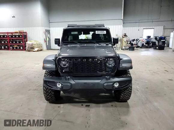 2024 Jeep Wrangler Willys with VIN 1C4PJXDG5RW312580, listed as a Copart auction lot 49144005 with 5,713 mi miles and Salvage Title. Bid and sale history available at carsss.com. Image 11.