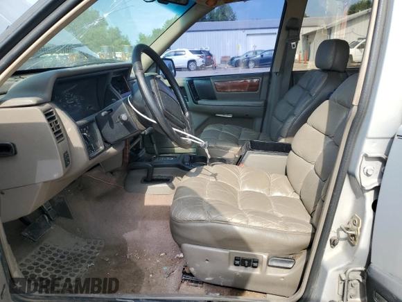 1994 Jeep Grand Cherokee Limited with VIN 1J4GZ78S1RC206288, listed as a Copart auction lot 62392685 with 207,731 mi miles and Salvage title. Bid and sale history available at DreamBid. Image 7.