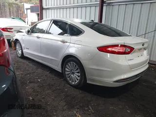 2013 Ford Fusion SE Hybrid with VIN 3FA6P0LU1DR357428, listed as a IAAI auction lot 41153491 with 153,738 mi miles. Bid and sale history available at carsss.com. Image 3.