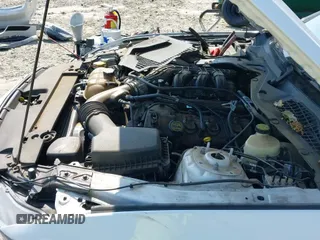 2016 Ford Mustang V6 z VIN 1FA6P8AM7G5241160, wystawiony jako IAAI lot #43247558 z przebiegiem 87 584 mil mil oraz . Historia ofert i sprzedaży dostępna na DreamBid. Obrazek 21.