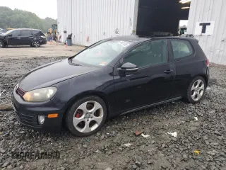 2010 Volkswagen GTI with VIN WVWFD7AJ3AW412457, listed as a Copart auction lot 60601085 with 118,664 mi miles and Salvage title. Bid and sale history available at DreamBid. Image 1.