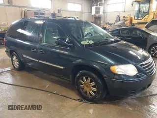 2007 Chrysler Town & Country Touring z VIN 2A4GP54LX7R207730, wystawiony jako IAAI lot #42080652 z przebiegiem 189 864 mil mil oraz . Historia ofert i sprzedaży dostępna na DreamBid. Obrazek 1.