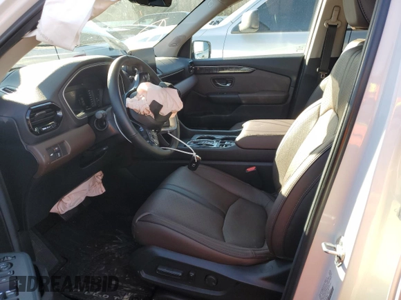 2025 Honda Pilot Elite with VIN 5FNYG1H82SB058680, listed as a Copart auction lot 42996425 with 9,890 mi miles and Salvage Title. Bid and sale history available at DreamBid. Image 7.