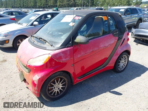 2012 Smart fortwo Pure z VIN WMEEJ3BA6CK527612, wystawiony jako IAAI lot #42750164 z przebiegiem Nie podano mil oraz . Historia ofert i sprzedaży dostępna na DreamBid. Obrazek 2.