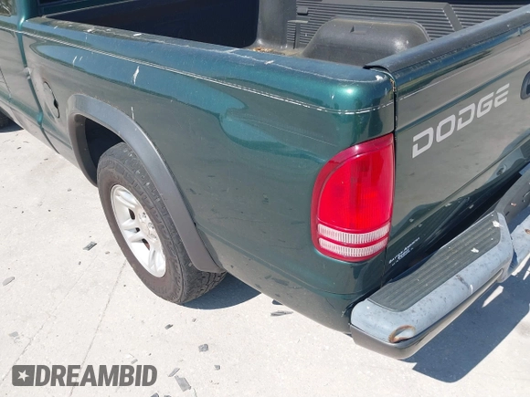 2002 Dodge Dakota with VIN 1B7GL12X32S619222, listed as a IAAI auction lot 41793106 with 97,649 mi miles and . Bid and sale history available at carsss.com. Image 13.
