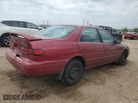 1998 Toyota Camry LE z VIN JT2BG22K6W0179063, wystawiony jako Copart lot #56998295 z przebiegiem 251 129 mil mil oraz Szkoda całkowita • Salvage title. Historia ofert i sprzedaży dostępna na DreamBid. Obrazek 3.