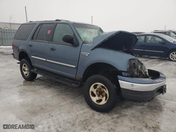 2000 Ford Expedition XLT with VIN 1FMPU16L5YLA81271, listed as a Copart auction lot 84614544 with 0 mi miles and Salvage Title. Bid and sale history available at carsss.com. Image 4.