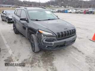 2016 Jeep Cherokee Latitude with VIN 1C4PJMCB9GW152673, listed as a IAAI auction lot 41704412 with 140,559 mi miles and . Bid and sale history available at DreamBid. Image 1.