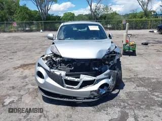 2014 Nissan Juke SV z VIN JN8AF5MV9ET359296, wystawiony jako IAAI lot #42250580 z przebiegiem 97 249 mil mil oraz . Historia ofert i sprzedaży dostępna na DreamBid. Obrazek 12.